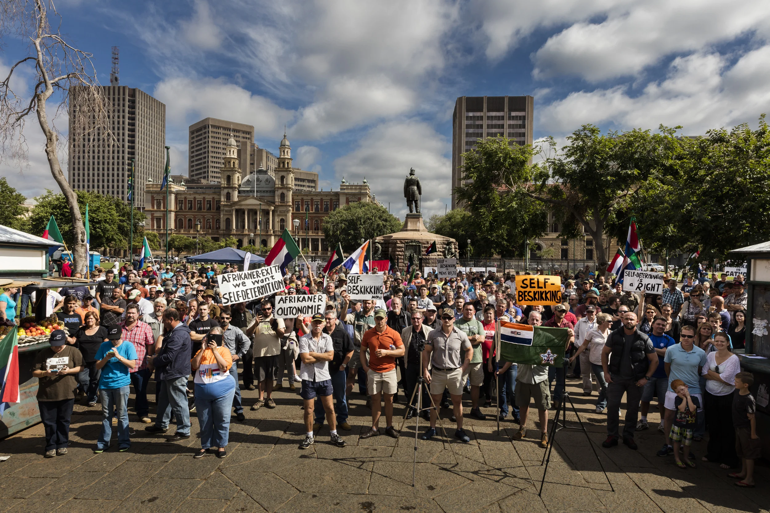 PRETORIA, SOUTH AFRICA, 25 NOVEMBER 2016: A demonstration against farm murders by right wing groups and farmers by the statue of Afrikaner patriarch Paul Kruger. Official government statistics are censored by the ANC government but the highest figures state that 3398 farmers have been killed in farm attacks since 1994. Figures from the NGO Agriforum and the Transvaal Agricultural Unino place the number of murders just under 2000 and the number of attacks as close the 5000 since 1994. Farmers say that the numbers are far higher. The ANC government instructed the police to stop keeping these records, stating it was bad for investment. Right wing groups all say that officially police in South Africa have a 33/100000 chance of being killed every year. Farmers in South Africa have a 158/100000 chance making them the most vulnerable population group in the world. Since 1994 there have been 328 244 murders in South Africa, with over 80 000 whites killed. Farmers in particular have little recourse to the law and must largely protect themselves. They formed Kommando groups to do this but the ANC government banned these. Since then, farmers remain reliant on themselves and small community protection groups. On average, there is a farm attack in South Africa every second day. The vast majority of these attacks involve significant numbers of attackers and violence, torture and rape are common. These attacks have polarized South Africa further and hate speech by black right wing movements like the EFF has accelerated this. (Photo by Brent Stirton/Verbatim for Le Figaro.)