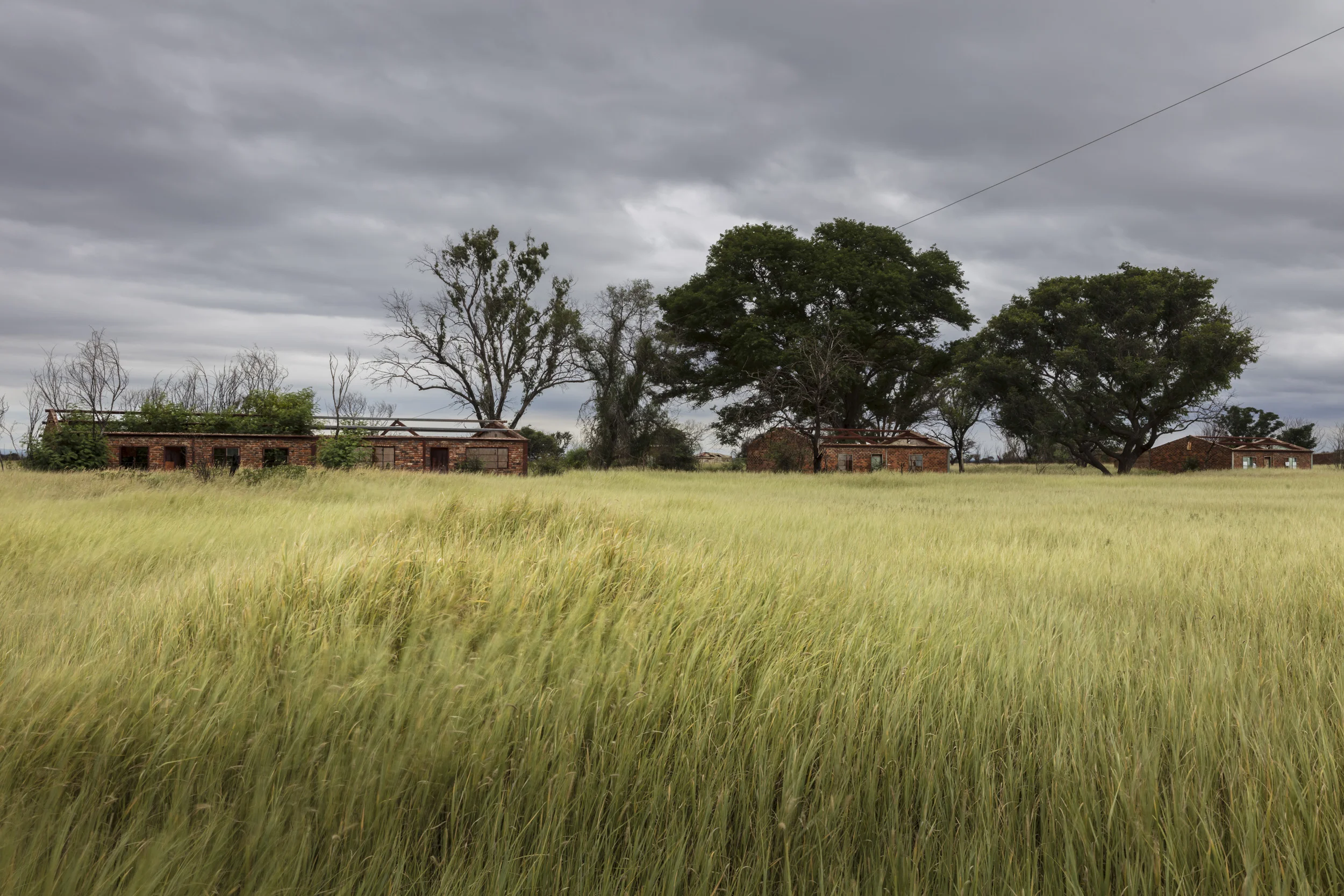 BELA BELA, SOUTH AFRICA, 21 FEBRUARY 2017: Abandoned farm labor living quarters lie open on a diminished farm. In 1994 over 105 000 commercial farms existed, now the number of working farms is down to just under 30,000. High inflation combined with a 35% unemployment rate mean food security is increasingly an issue as a result. Attacks on farms are often linked to an inside person increasing distrust between farmers and their labor. The ANC government have also increased the minimum wage law. This means farmers cannot afford to employ the same numbers and are increasingly turning to automation. (Photo by Brent Stirton/Verbatim for Getty Images.)