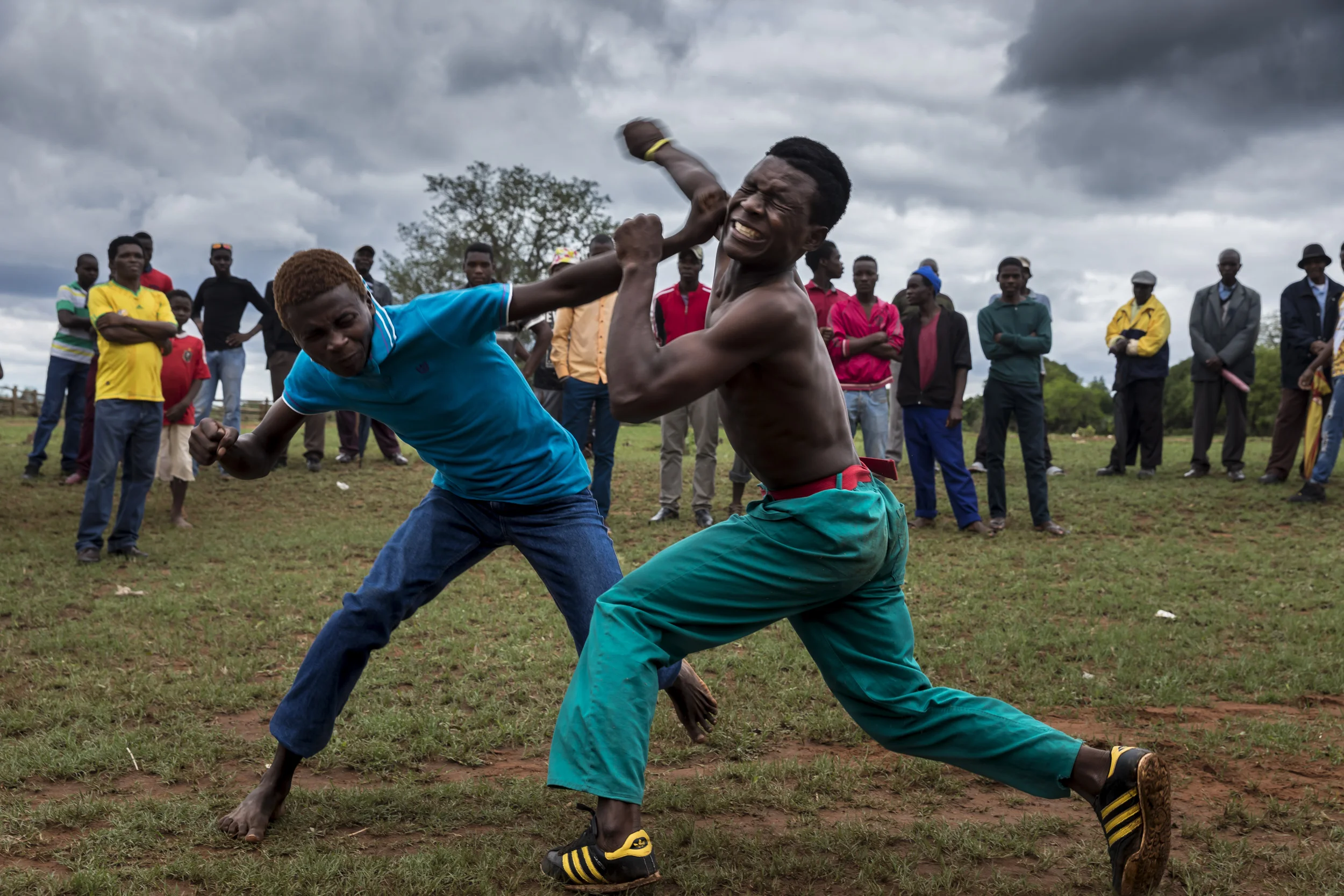 TSHIFIDI, VENDA, SOUTH AFRICA, 15 DECEMBER 2016: Men and boys of the Venda tribe challenge each other and fight bare knuckle over the festive period in South Africa. This is a tradition that dates back 200 years and began when herd boys tried to get their cattle bulls to fight with each other while they were being dipped for disease. The herd boys soon began to fight with each other and this became a tradition. The fighters may stop at any time and if a fighter starts bleeding the fight is stopped. It is seen a an outlet for the males in the community and nowadays there are champions on three different levels. (Photo by Brent Stirton/Verbatim for Le Figaro.)