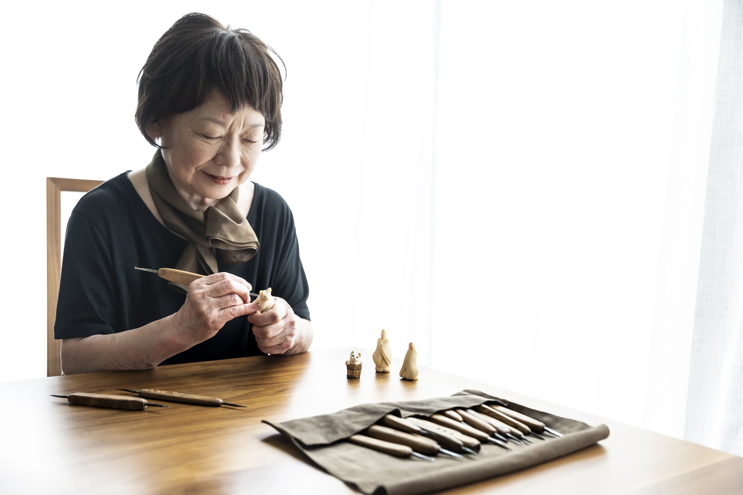 Tokyo Japan, April 2018: Reiko Nakamura has been studying ivory carving for 12 years. She is passionate about it. She received a tusk from her uncle 12 years ago and cut that up to make the material for her carvings. She first noticed ivory in antique markets and from there she began to be interested in carving herself. She attends classes with a master ivory carver in order to grow in her craft. She became aware of these classes when she saw them advertised in the newspaper. (Photo by Brent Stirton/Verbatim by Getty Images.)