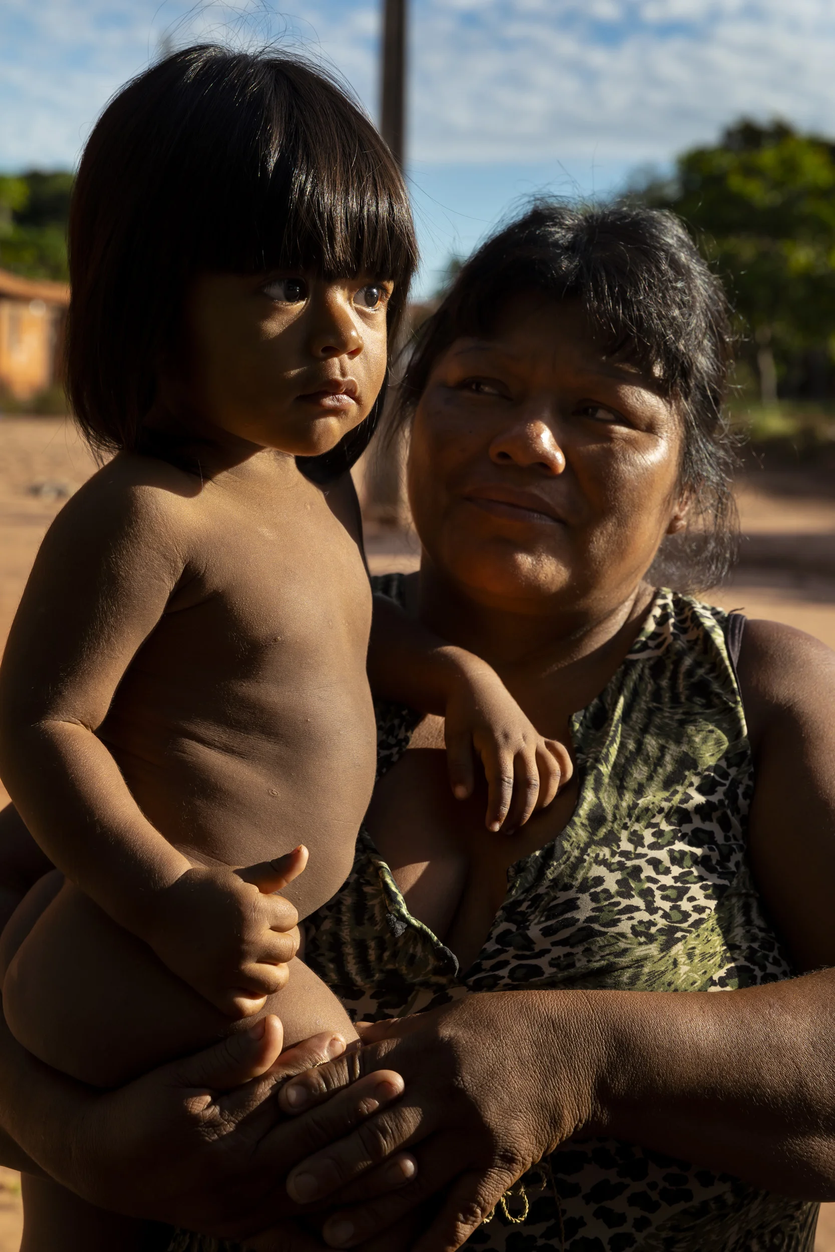 MARANHAO, BRAZIL, JUNE 2018: Scenes from the village of Governador, the central village in the tribal area for Gaviao Indigenous people. TI Governador is the ancestral territory of the Gavião people; it encompasses 42,000 hectares of Amazon forest. Governador has been noticeably affected by deforestation, with whole areas razed of trees, dry riverbeds and frequent forest fires. People in this village say that the old days were better, their forests held more animals for hunting, more fruit and there were no problems with loggers illegally cutting their timber.
This village was running a regular forest guardian patrol but funding for indigenous NGO’s has dried up and at this time there are no patrols due to that lack of funding. 3 years ago this village confiscated logging vehicles by force which led to a confrontation with the loggers. The village was abandoned by the military police, who were supposed to protect them from the illegal loggers. The military police only returned a week later during which time the village had to defend themselves. Environmental defenders in Governador have been subjected to threats, death threats, intimidation, assault and armed attacks. Defenders reported receiving threatening anonymous calls usually after seizing a truck during one of the patrols; sometimes the callers would also issue death threats towards the defender or towards their whole village. Loggers residing in the neighboring town have intimidated and physically assaulted at least 2 indigenous leaders when they traveled to town. In one instance loggers intimidated shop owners in town so they wouldn’t sell gas to indigenous people for two weeks. To date, there seem to have been no killings of Gavião environmental defenders in retaliation for their activism.
Gavião people are ambivalent about the role of the State. Several environmental defenders have worked or continue to work with Funai, the specialised governmental agency for indigenous issues. They know well the