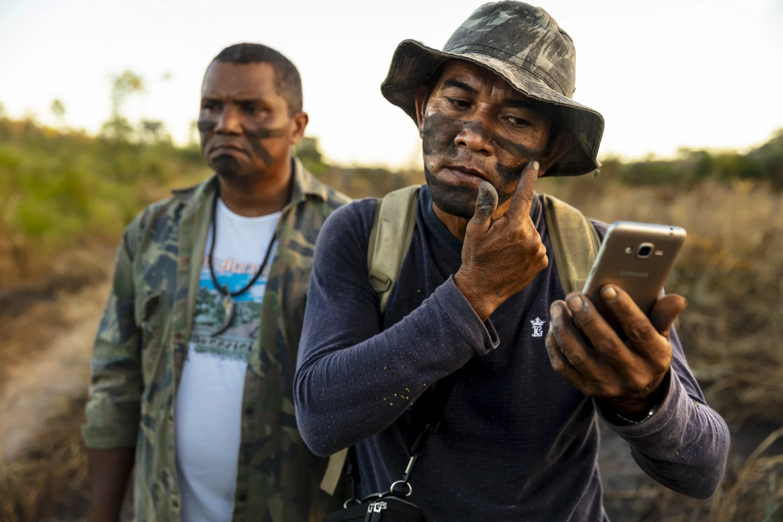 MARANHAO, BRAZIL, JUNE 2018: Members of the Forest Patrol from the village of La Goa Comprida in Arariboia Indigenous territory. In this village illegal loggers attacked locals when the locals confiscated their logging vehicles. One indigenous man, Tomes, was killed defending his wife and a logger was also shot. Tomes is survived by 2 daughters Graca Guajajara and Jaciane Guajajara. They remain in a deeply saddened state about his killing to this day. This village has little real funding but they continue to send out forest patrols they call forest guardians. This consists of motorbike patrols when they have fuel. Arariboia is the ancestral territory of the Guajajara, it encompasses 413,000 hectares of Amazon forest. The Guajajara share this land with the Awá Guajá, who live in voluntary isolation. Arariboia is the most populated territory we visited, with visible signs of deforestation in the areas we visited. The Guajajara have been organised since 2013 to monitor their territory, they call these patrols Indigenous Environmental Inspectors (Agentes Indígenas Ambientais). Arariboia is divided in 8 regions and each region has 15 inspectors, they all answer to one General Coordinator. In turn, the General Coordinator answers to a council of village chiefs. The inspectors received some funding for several years from FUNAI for transport and food expenses, in addition to some basic training. However, the funding stopped in 2015. Guajajara inspectors have engaged in violence against the loggers they apprehend, including beatings and setting on fire their equipment. These acts of violence seem to have taken place under the supervision of Olimpo Guajajara, who was reportedly removed from his position for these incidents. The Guajajara foresee no community enforced sanctions when their own are complicit in environmental crimes. The Guajajara will often acknowledge widespread participation of their own people in environmental crimes, including three village chiefs. Guajaj