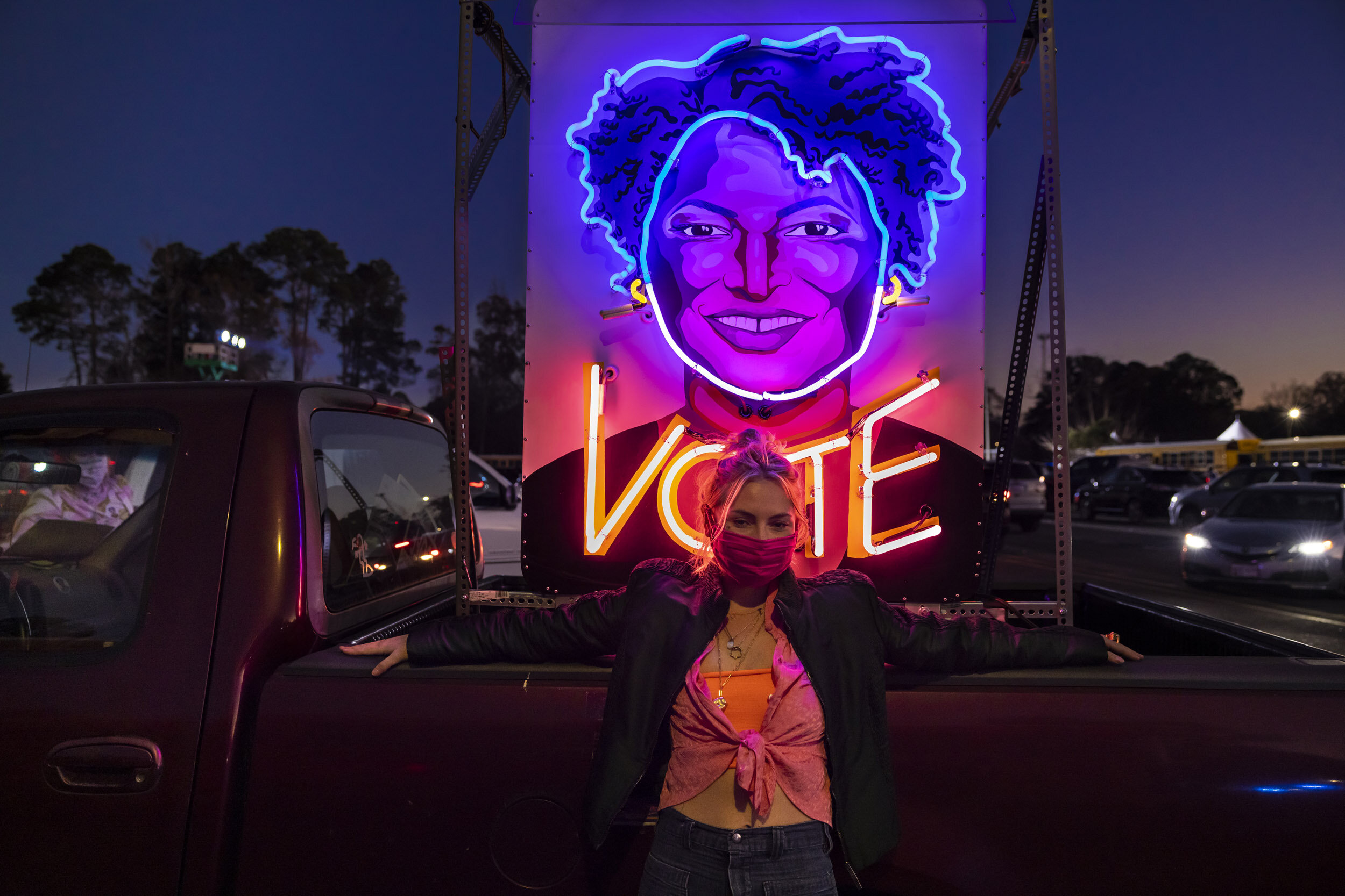 Three days of election coverage in Georgia for the 2021 US Senate election. First image - Democrat supporters who travelled from Texas to help people to vote at the end of a rally led by Kamala Harris