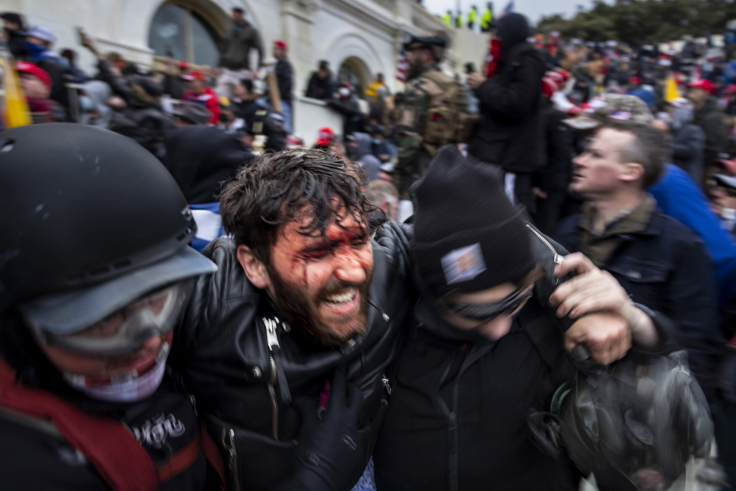 WASHINGTON D.C., USA - JANUARY 6: Trump supporters clash with police and security forces as people try to storm the US Capitol in Washington D.C on January 6, 2021. - Demonstrators breeched security and entered the Capitol as Congress debated the 20
