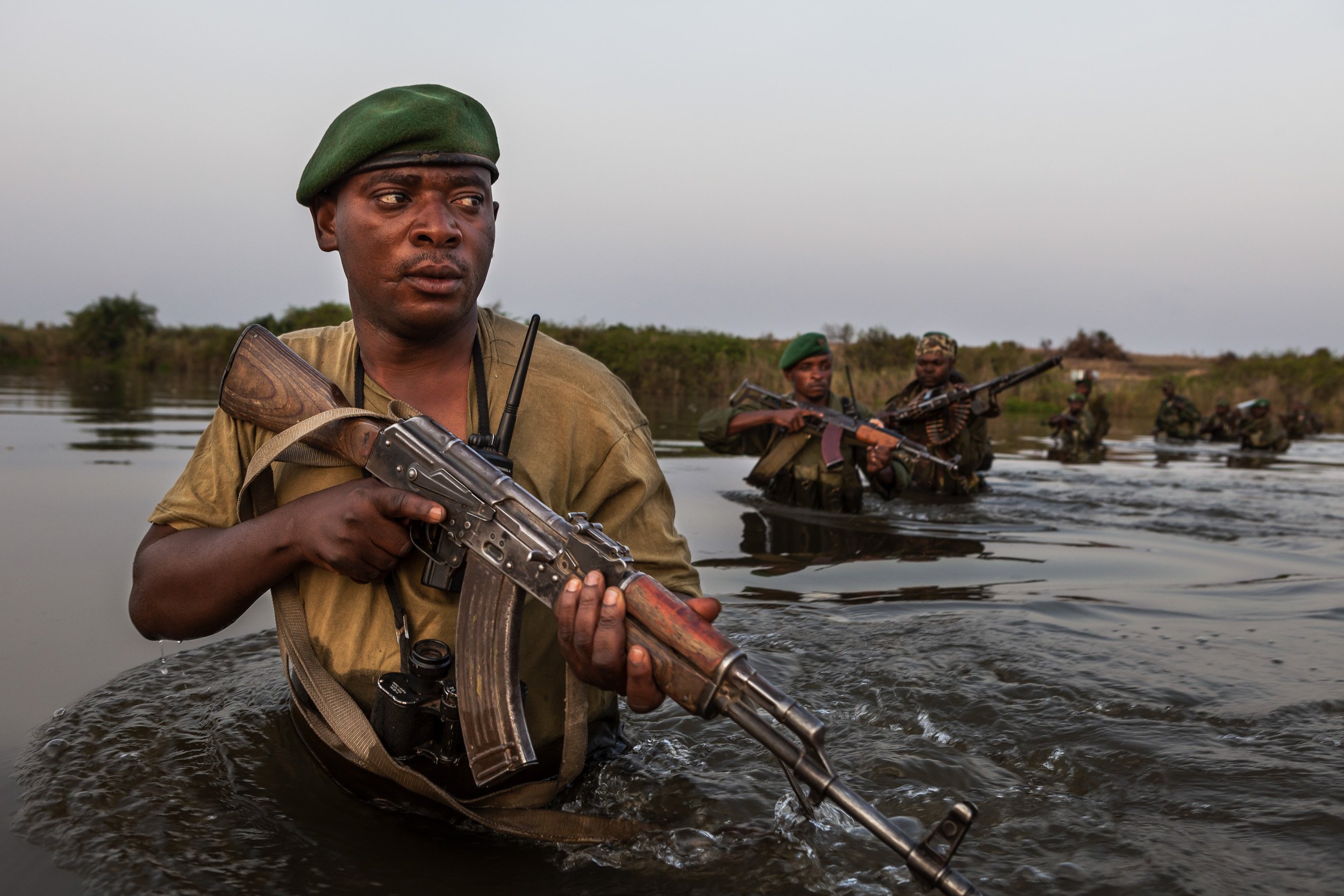 CHONDO, VIRUNGA NATIONAL PARK, DEMOCRATIC REPUBLIC OF CONGO, MARCH 2012: A combined team of ICCN Congolese conservation rangers and members of the Congolese army patrol an area known to have a FDLR rebel presence, Chondo, Virunga, 12 March 2012. The