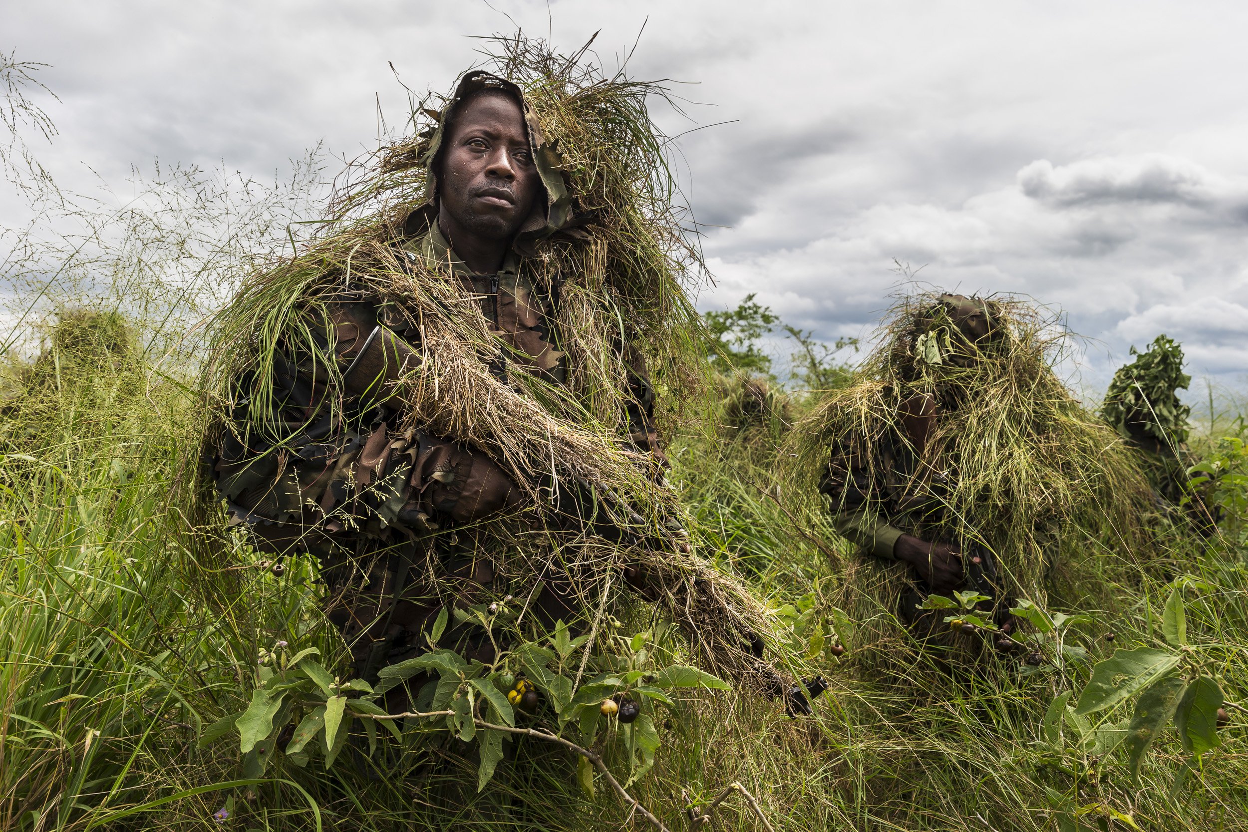 ISHANGO, VIRUNGA NATIONAL PARK, DEMOCRATIC REPUBLIC OF CONGO, 6 MAY 2015: European Union commissioned instructors teach Virunga National Park rangers skills for concealment, bush craft, weapons and survival in their fight against paramilitary groups