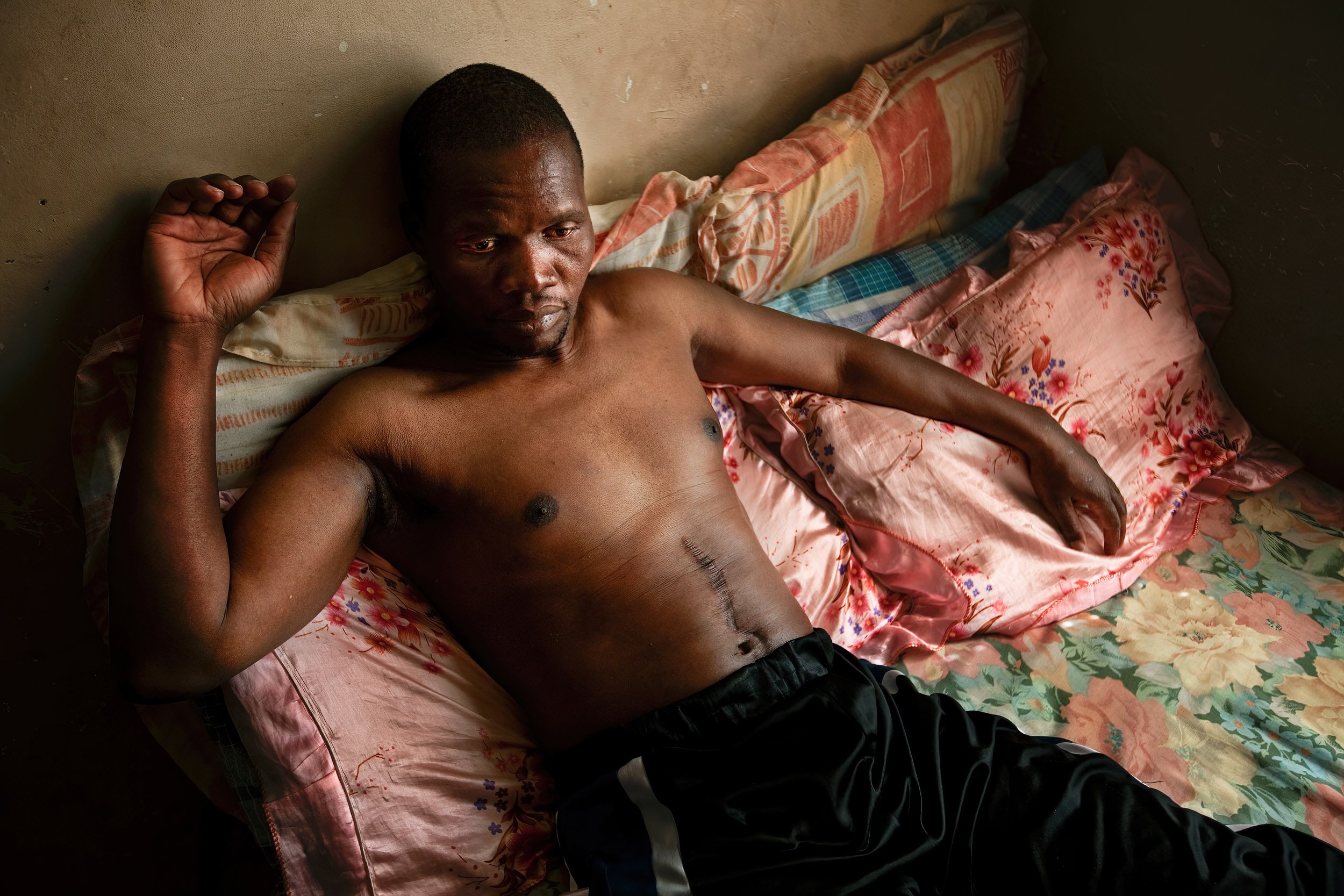 JOHANNESBURG, SOUTH AFRICA, JUNE 2009: Adrian Chirabe, 45, the National Co-ordinator for the Veteran Activists Association of the Zimbabean opposition party, the MDC, photographed in his single room dwelling in Johannesburg, 3 June 2009. Chirabe was