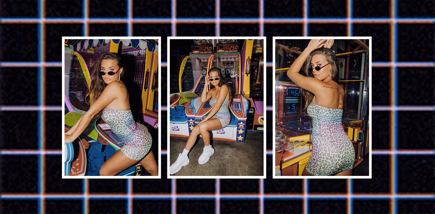 Bella wears the Quin Dress , Bounce Sneakers and Eclipse Sunglasses .