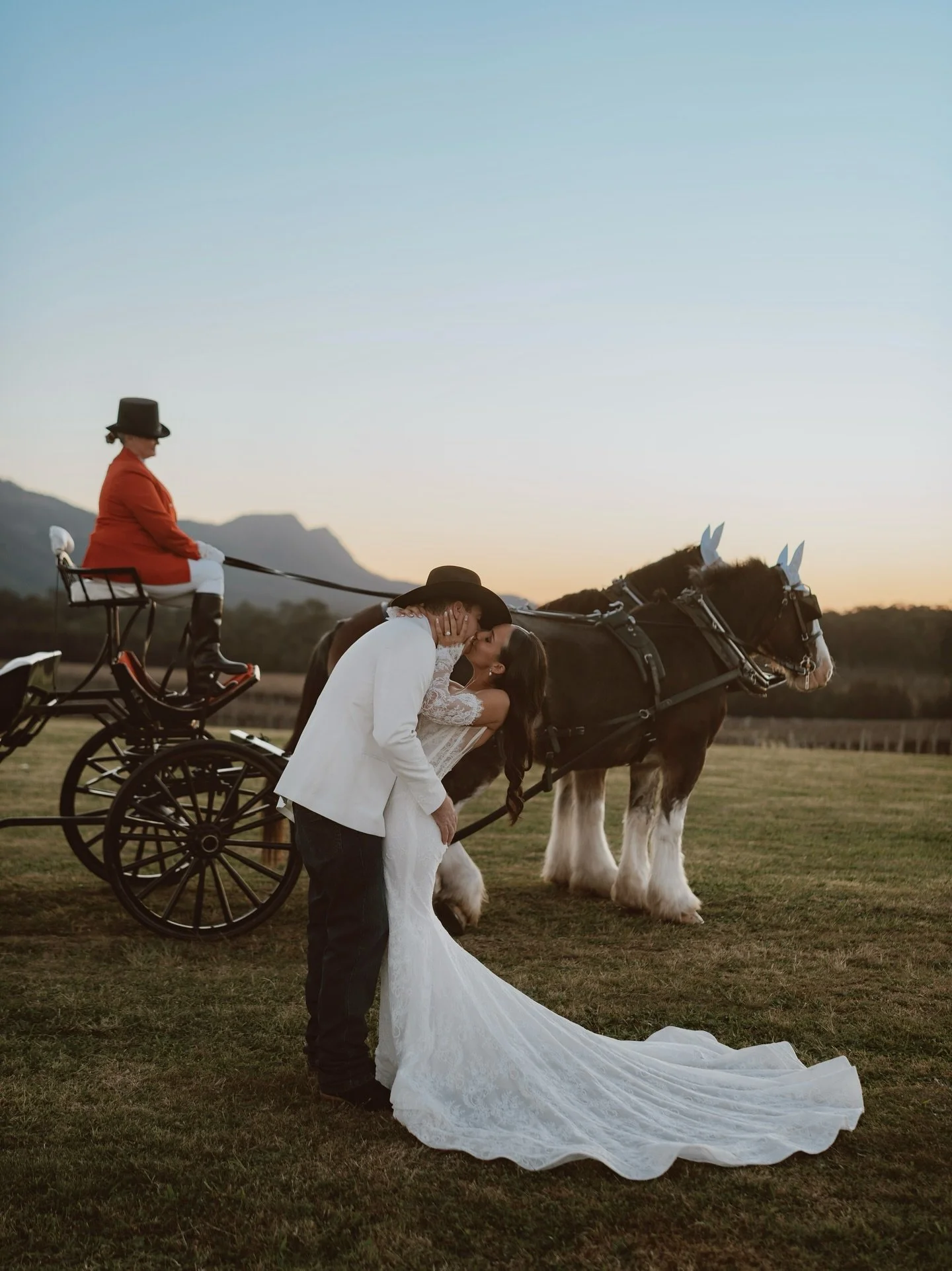 We feel so honoured to have created this gown for the gorgeous @cienna.hodgman &mdash;modern, romantic, and a little wild at heart ❤️ 
 Here&rsquo;s to the Hodgmans, to love that feels like home, and to a day laced with those western‑kissed details y