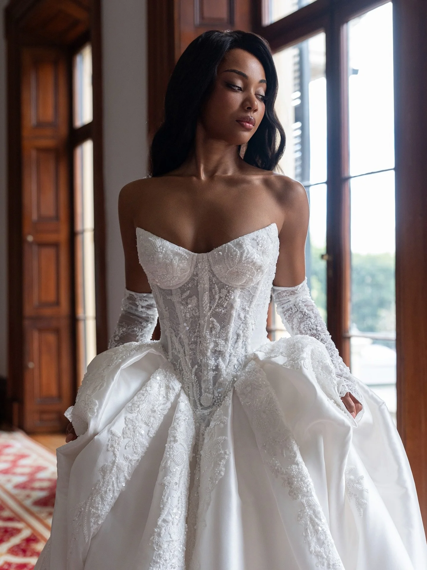 C O S E T T E is stepping into the spotlight ✨ 

From our R&ecirc;verie du Manoir collection, she&rsquo;s crafted in luminous Mikado with a sculpted corset and jeweled details that catch every light. 

Drama, power, and grace&mdash;all in one. Catch 
