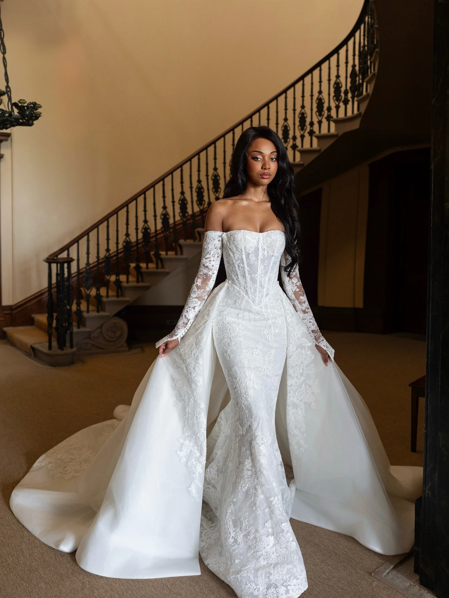 Meet N O &Eacute; M I ✨ 

Effortless sensuality meets couture edge. Her figure-hugging Chantilly lace silhouette sculpts every curve, while the off-shoulder neckline and lace sleeves whisper elegance. 

Add the overskirt, and she transforms &mdash; s