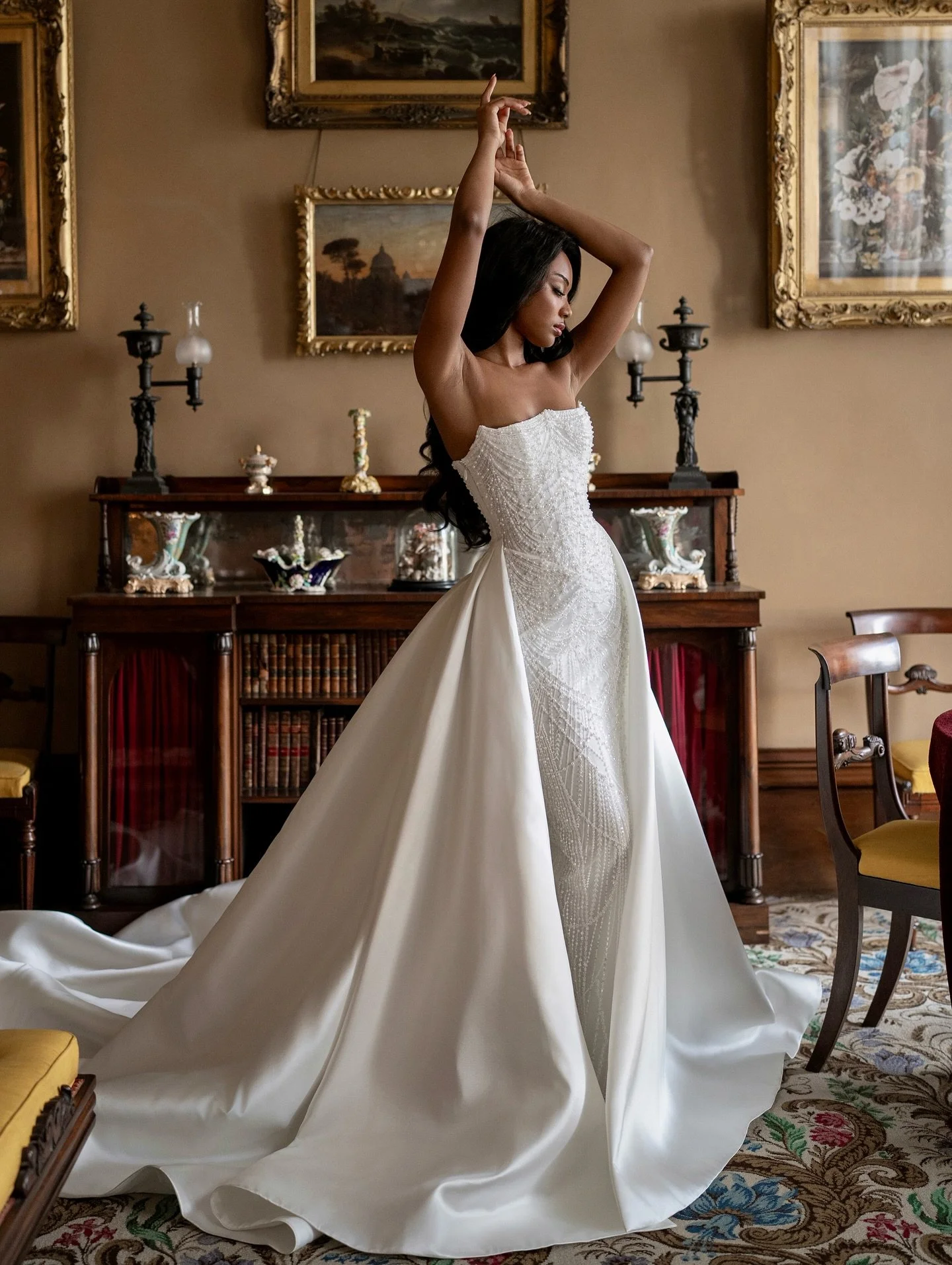 Meet J O S E P H I N E ✨ 

Pure modern sophistication &mdash; sleek, sculpted, and made to shine. Her beaded gown glimmers with geometric precision, while the distinctive neckline and mikado overskirt bring that couture drama. 

For the bride rewriti