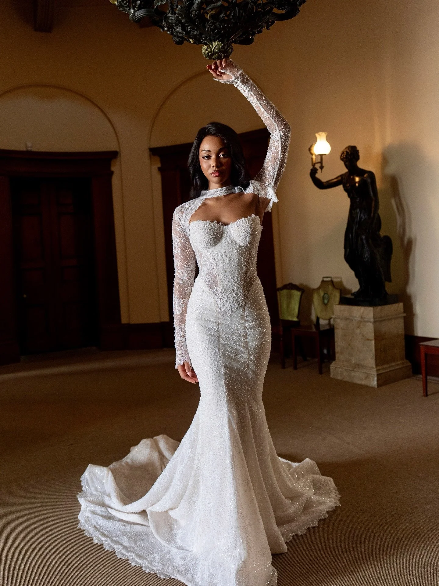 Meet A N G E L I N A ✨ 

Bold. Luminous. Unforgettable. Every inch of her fully beaded silhouette glows like liquid light, sculpting the body with effortless allure. Her cut-out corset defines the waist, while a detachable bolero adds that extra dose