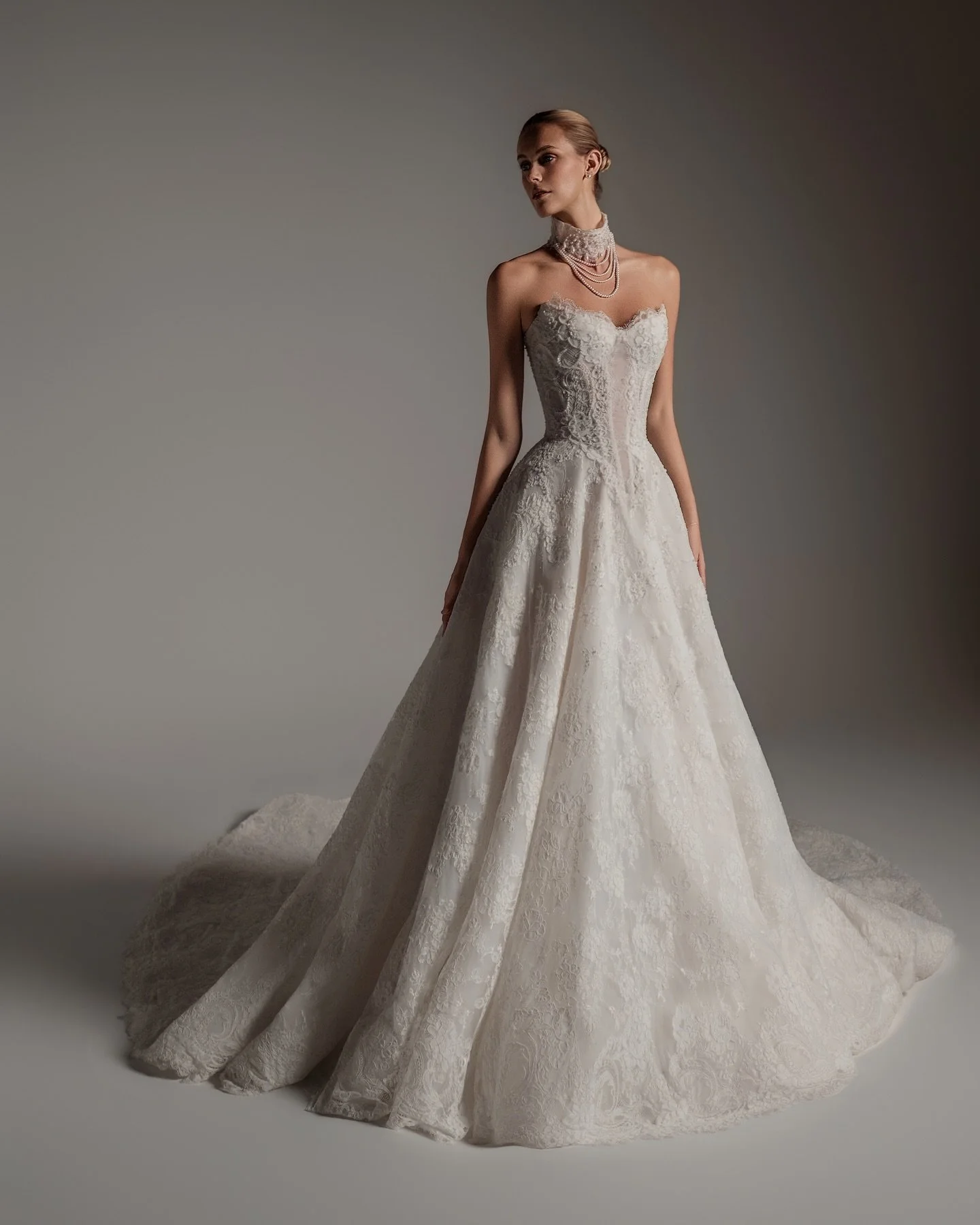 Meet A N N A L I S E ✨

A soft yet confident A-line gown in corded Chantilly lace, finished with subtle hand-beading that catches the light. From her sheer corset bodice and delicate boning to her flowing skirt and romantic lace sleeves, Annalise is 