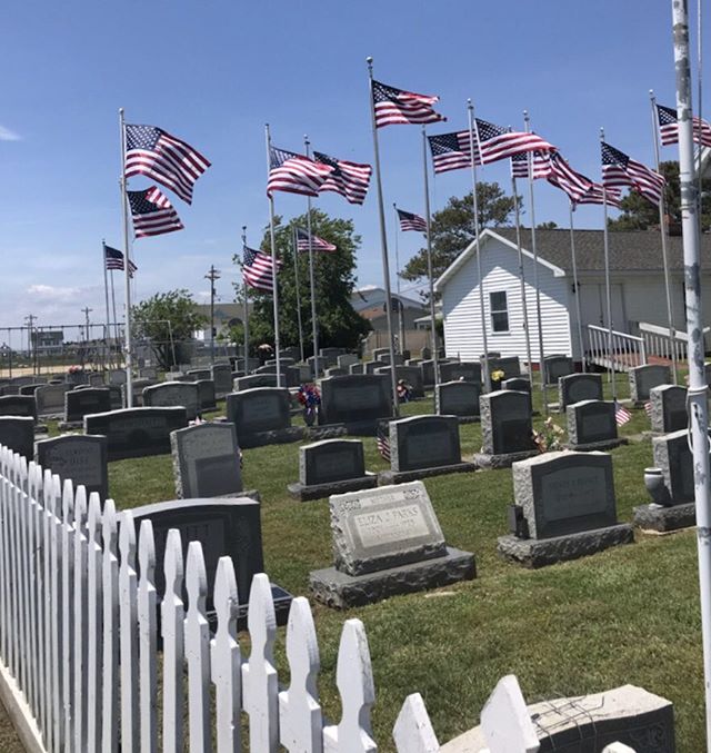 Flags fly high on Tangier Island.