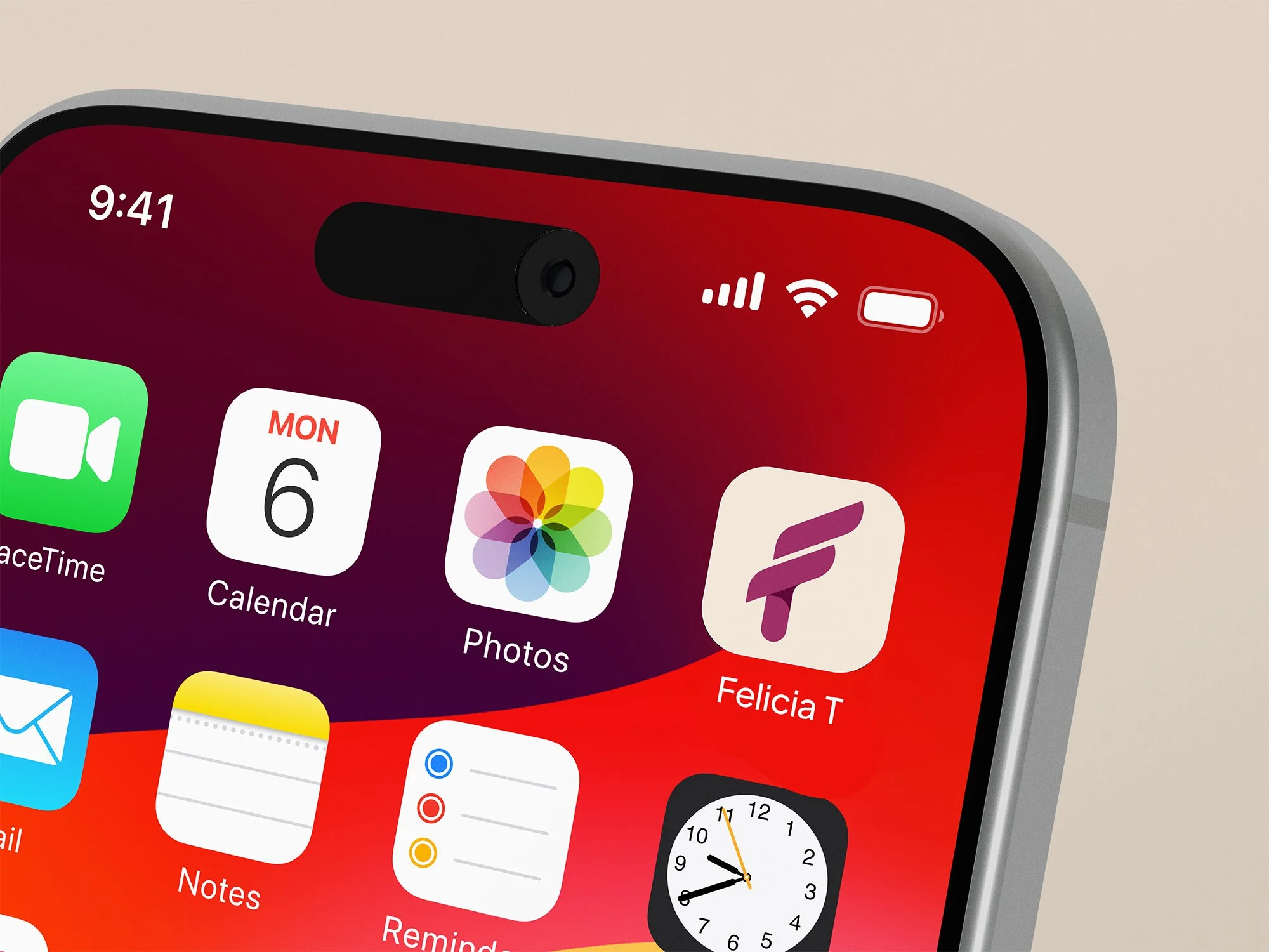 A close-up of an iPhone screen showing various app icons including FaceTime, Calendar, Photos, Felicia T, Mail, Notes, Reminders, and a clock widget. The top right corner displays signal strength, Wi-Fi, and battery icons. The time is 9:41.