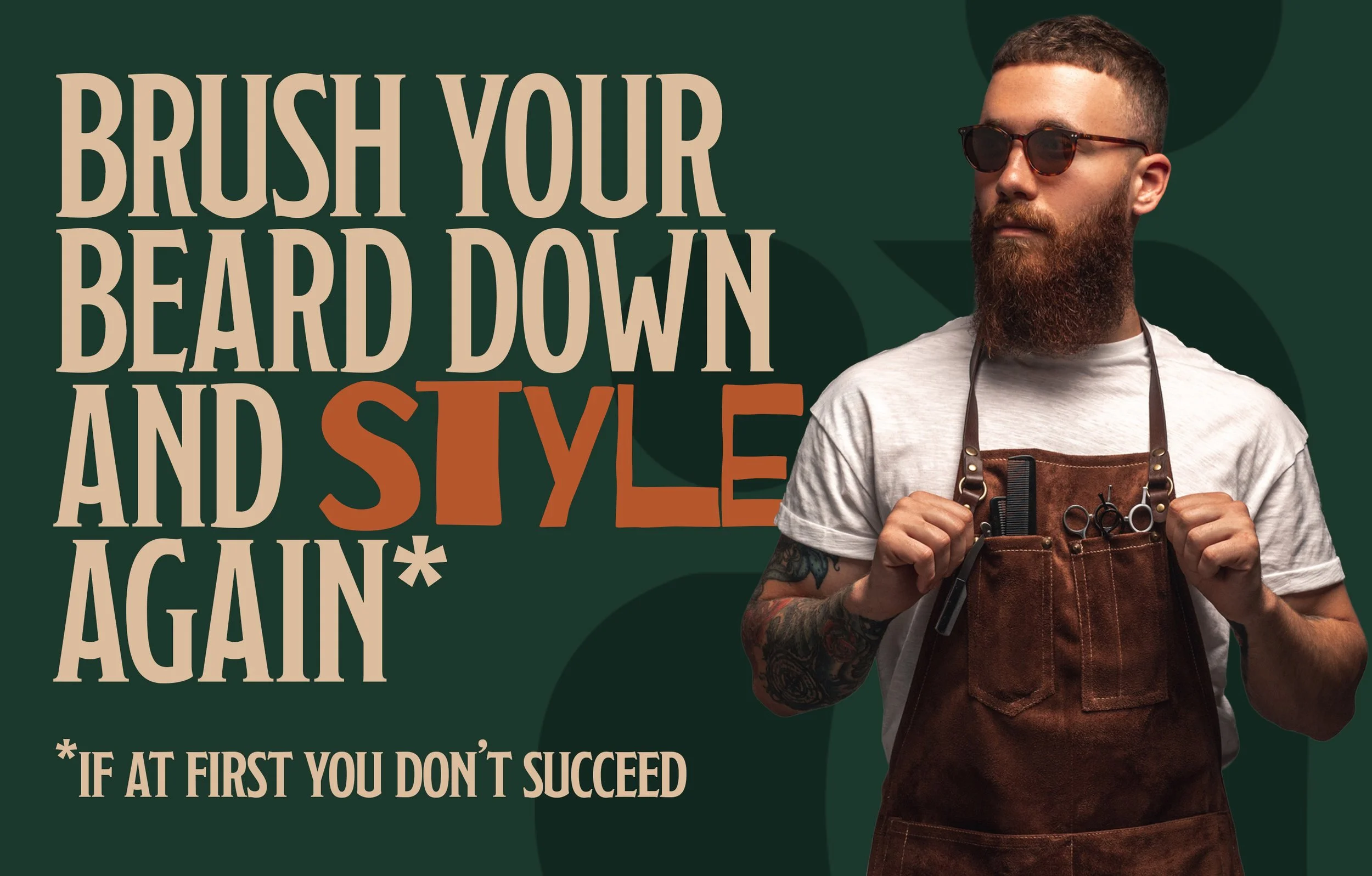A man with a beard and sunglasses wearing a white t-shirt and an apron holding barber scissors and a comb, standing in front of a dark green background with the text, 'Brush your beard down and style again if at first you don't succeed.'