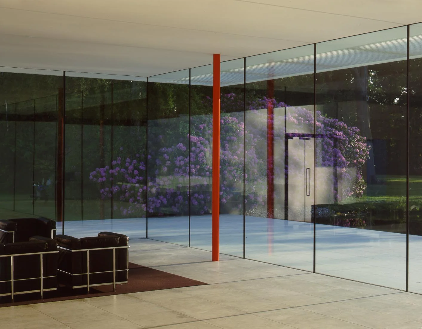 The limestone floor extends 5.4 m beyond the glass line of the windows.In fact more limestone was laid outside than inside , increasing the sense of space.