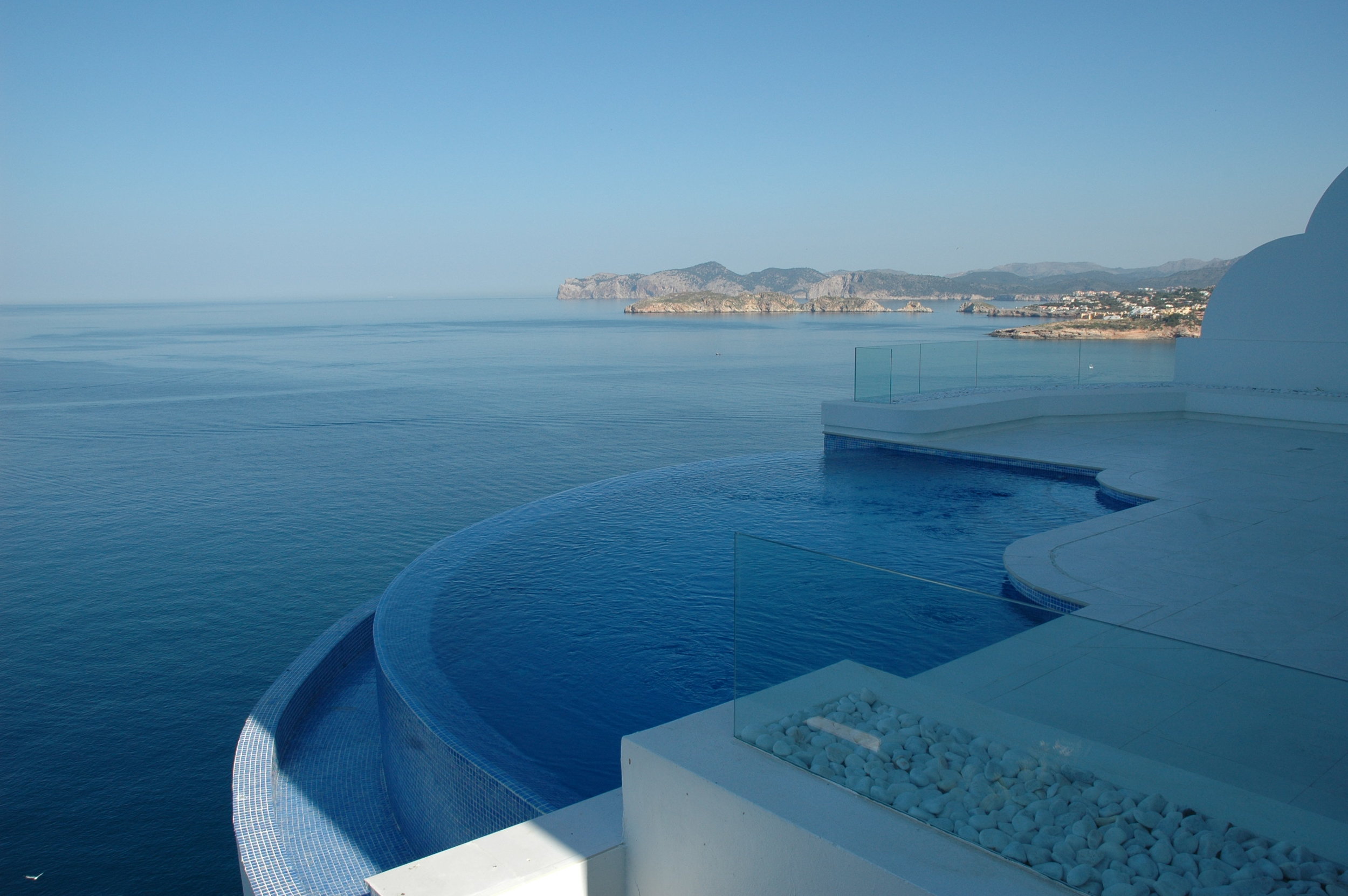 The renovated pool terrace with views to the Malgrat Islands .