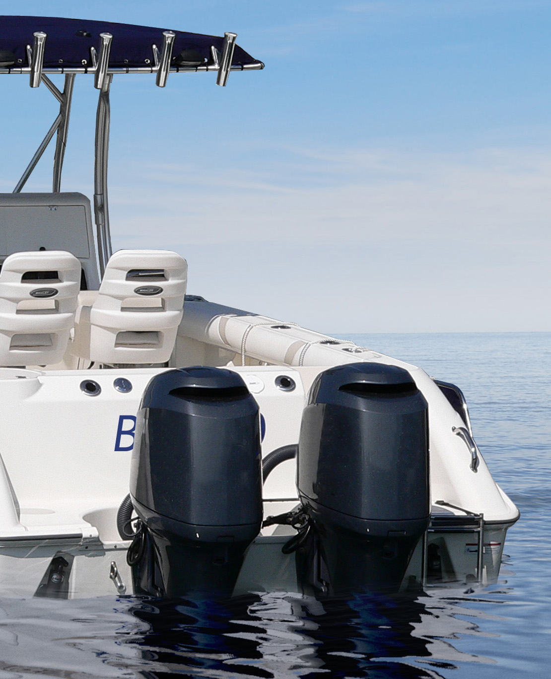 240 Boston Whaler 'Bluesky' with outbaord engines resprayed to remove all decals.