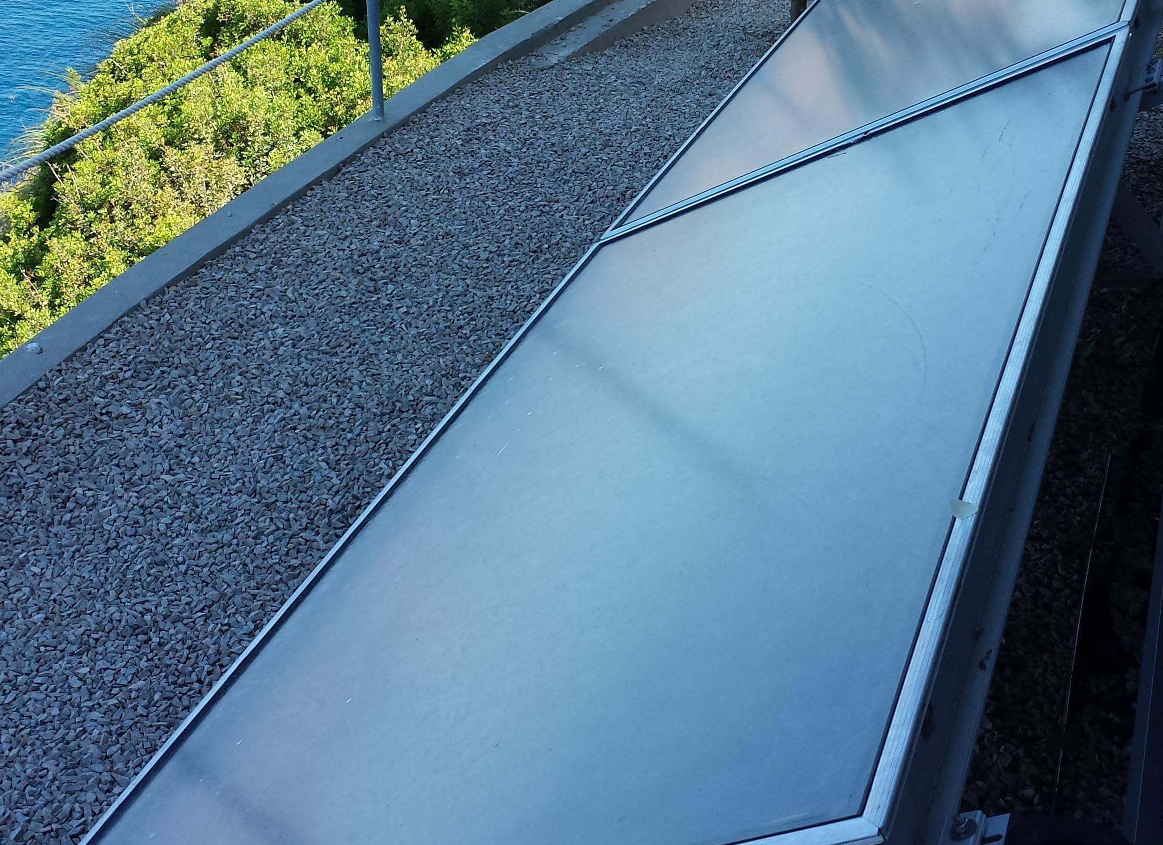 Solar panels at lower terrace level.