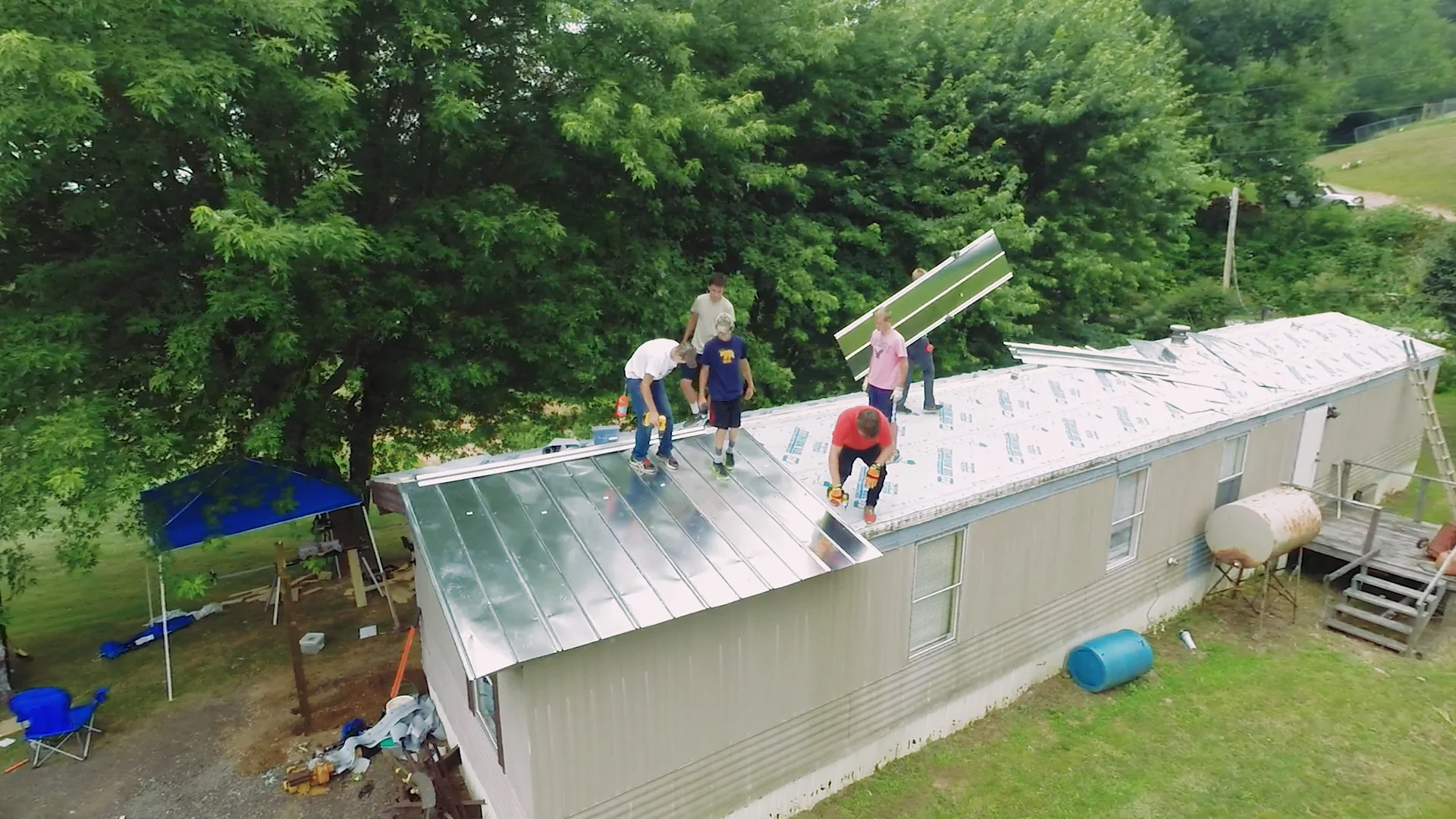 kids on roof.jpg