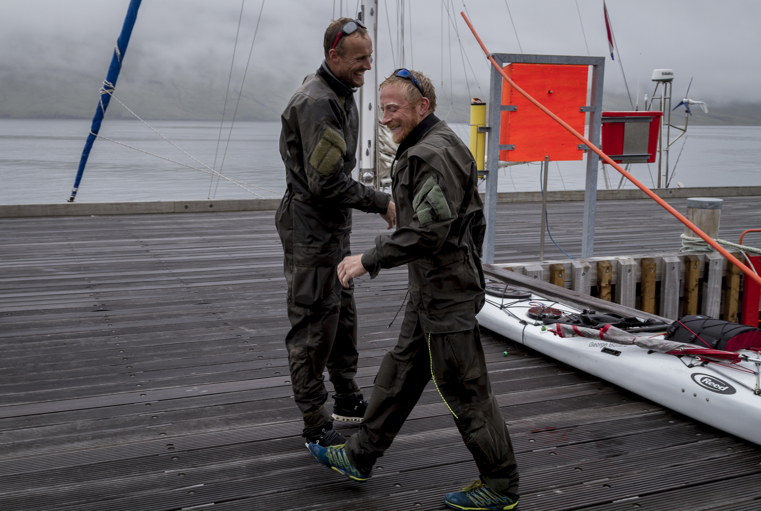 Either this shows that morale is high.. or they are practicing for a spot of Scottish Reeling!