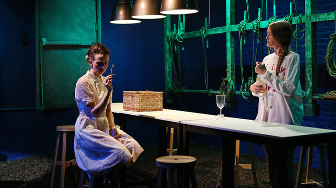  Left to right: Kristen Sieh as Emily and Emily Davis as Portia DeRossi. 