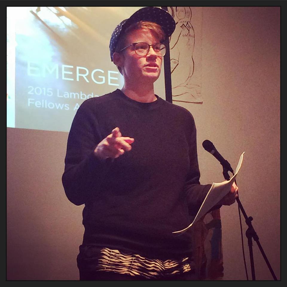 Jess Pane reading at an offsite event for LAMBDA.