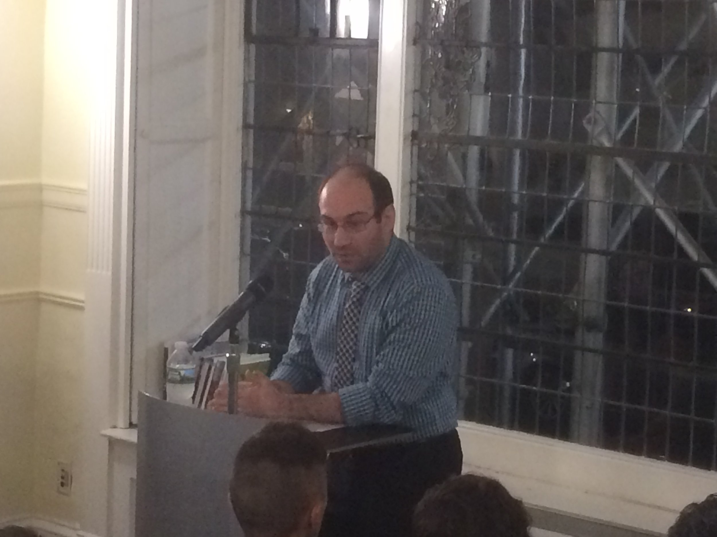 Former Fiction Editor, Mike Sarinsky, introducing Matthew Baker. 
