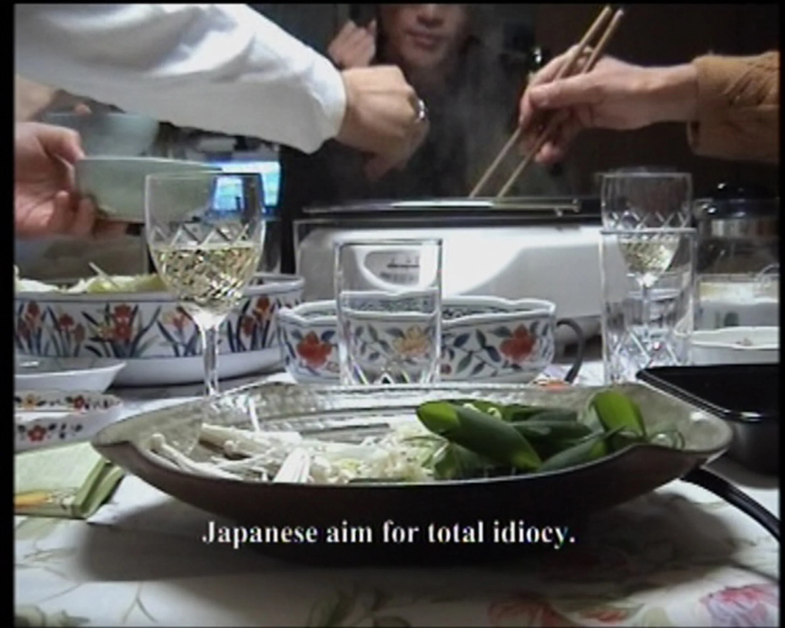  2005DV single channeltotal duration 9:00 min.  It is a conversation-piece as in a family portrait in video. Participants are linked by an activity, in this case having a sukiyaki party. The camera is focused on their hand movements while we hear the