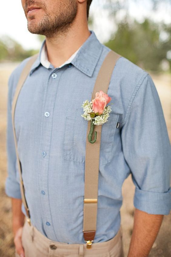 07-tan-pants-and-a-baby-blue-shirt-suspenders-and-a-boutonniere-on-them.jpg