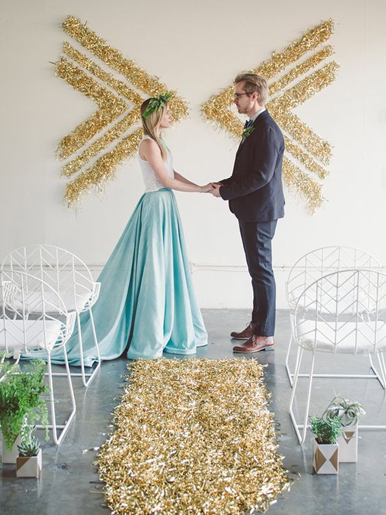 30-gold-glitter-ceremony-backdrop-of-chevrons-made-on-the-wall.jpg