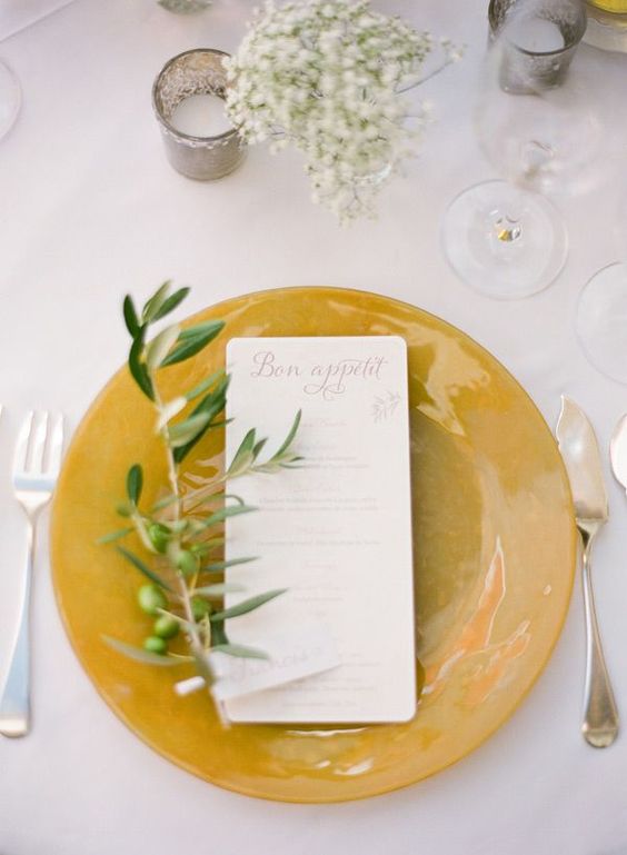 21-a-mustard-charger-with-an-olive-branch-and-babys-breath-for-a-fall-tablescape.jpg