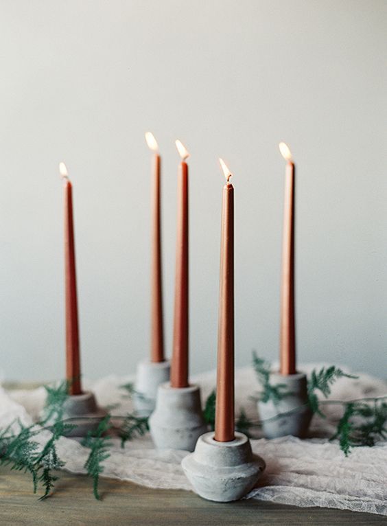 20-round-concrete-candle-holders-with-copper-candles.jpg