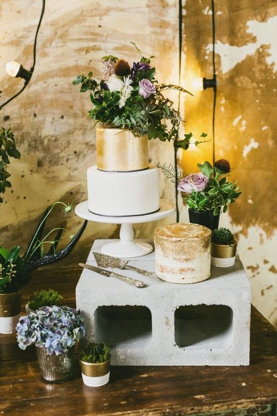 21-simple-concrete-cake-stand-creates-a-perfect-contrast-with-refined-gold-cakes.jpg