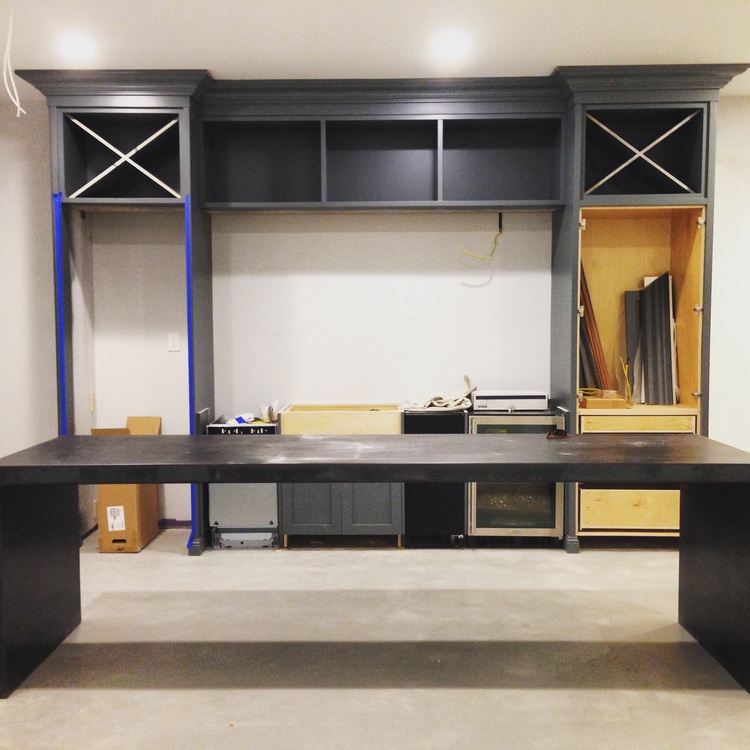 Blackened steel, BM grey cabinetry, concrete floors 