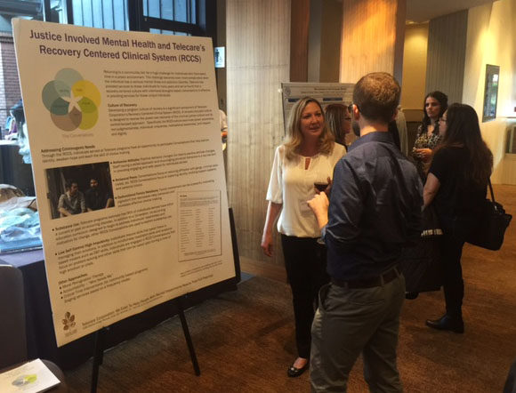 Cheryl Malinowski , Regional Director Central Coast and CORE LA, speaks to participants during the poster session at the Forensic Mental Health Association of California Conference on March 16, 2016.