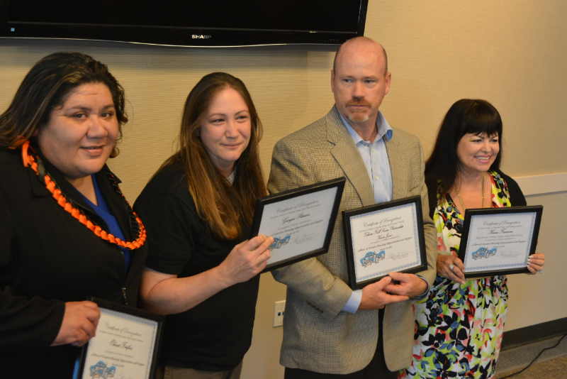 Kevin Jones, second from right, stands among three other honorees at an Oct. 22 award ceremony recognizing excellence in housing. Also pictured is Ohevet Fotofini, a board and care operator; Georgia Peterson, a shelter operator; and Karen Francone o鈥�