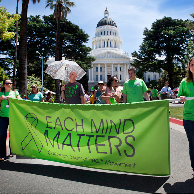 MENTAL HEALTH MATTERS DAY PARTICIPANTS RALLY OUTSIDE THE CAPITOL BUILDING IN SACRAMENTO. PHOTO: EACHMINDMATTERS.ORG