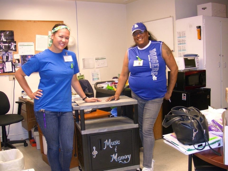 At La Paz Geropsychiatric Center, staff members, Erish McInnis and Kristen Crowe, project leads, show off their mobile Music &amp; Memory cart!