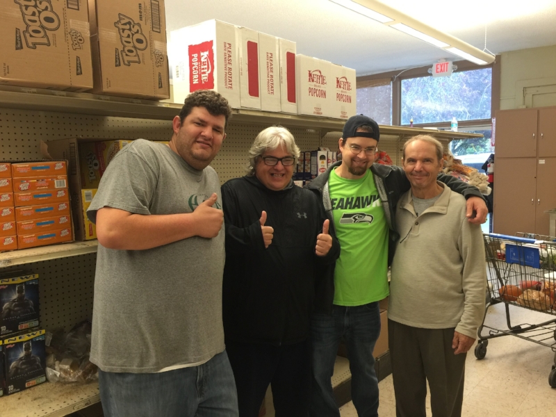 (L-R) WOODBURN VOLUNTEERS CHRIS R., ALAN S., OLIVER P., WITH FOOD BANK SUPERVISOR WILBUR
