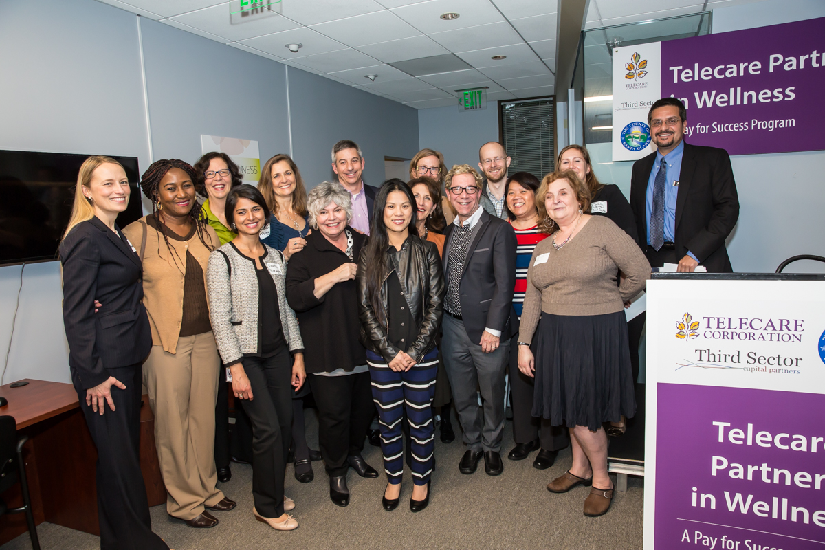 (L-R) Greta Hansen , Chief Assistant County Counsel for Santa Clara County; Margaret Obilor , Director of Adult Services for Santa Clara County; Faith Richie , Senior Vice President of Development at Telecare; Kavita Naratan , Deputy County Counsel for Santa Clara County; Shannon Mong , Director of Innovation Initiatives at Telecare; Toni Tullys , Director of Behavioral Health Services for Santa Clara County; Geoff Richman , Director of Budgets at Telecare; Michelle Ho , Mental Health Program Specialist for Santa Clara County; Anne Bakar , President and CEO of Telecare; Shelagh Little , Director of Business Development at Telecare; Scott Madover , Director of SUDS at Telecare; John Ginther , Manager at Third Sector Capital Partners Inc.; Dr. Tiffany Ho , Medical Director for Santa Clara County; Carol Silverman , Telecare Director of Evaluation; Caroline Whistler , President and Co-Founder of Third Sector Capital Partners, Inc.; and Miguel Marquez , Chief Operating Officer for Santa Clara County, at the Telecare Partners in Wellness Open House on February 8, 2017.