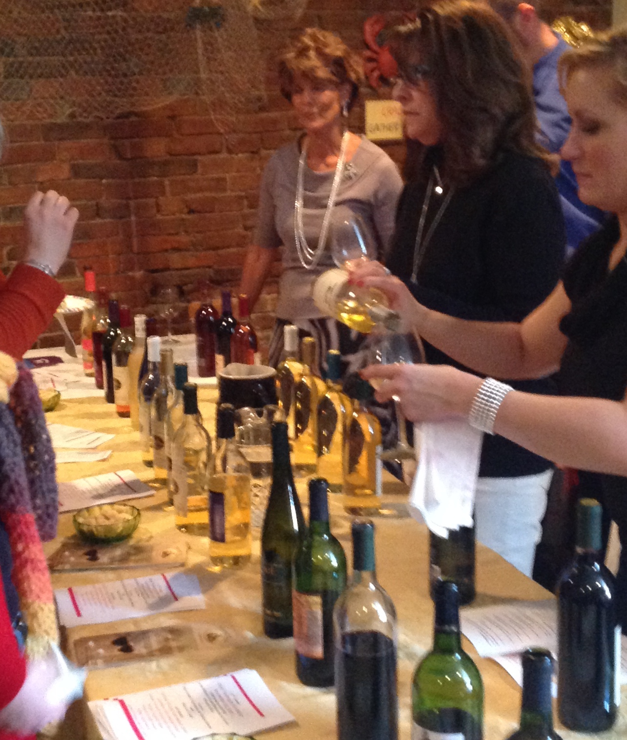 pix-wine tasting 2013 pourers at wine table.JPG