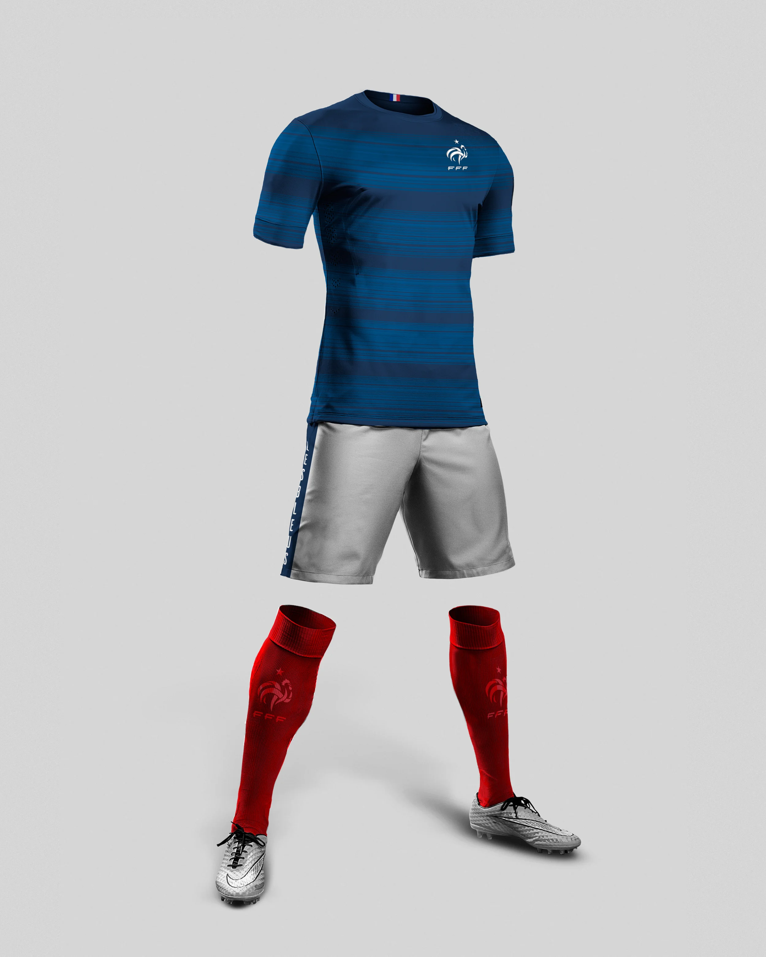 A combination of blue tones, made from brush strokes, adorn the shirt in order to encapsulate France's rich history as the art center of Europe, while also referencing the speed that the French team is known for playing. The shorts are white with accenting side stripes that feature the French National Team's nickname, "Les Bleus". Rounding out the uniforms, are a bold finish that cites Frances tri-color flag, red socks. Small touches of national pride are placed through out the jersey, from the French crest on the front of the uniform and socks, to a small tri-color flag placed inside the collar.
