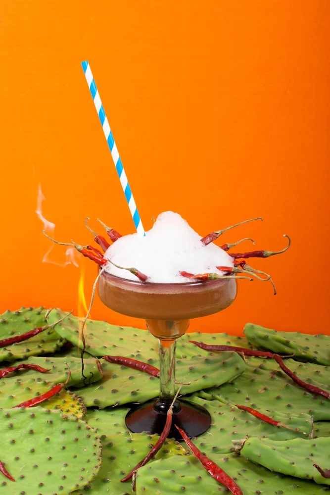  SPICY CACTUS MARGARITA Chipotle infused Mezcal, nopal, fresh sour, bitters, salt foam 