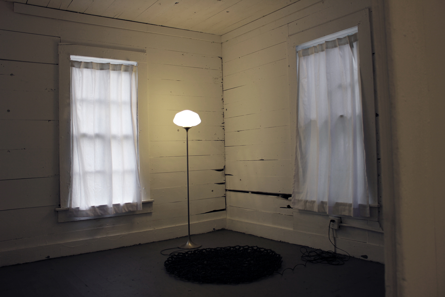 ELECTRICAL WIRE DOILY references the association between electricity and the spirit world that arose during the Spiritualist movement in America at the beginning of the 20th century.