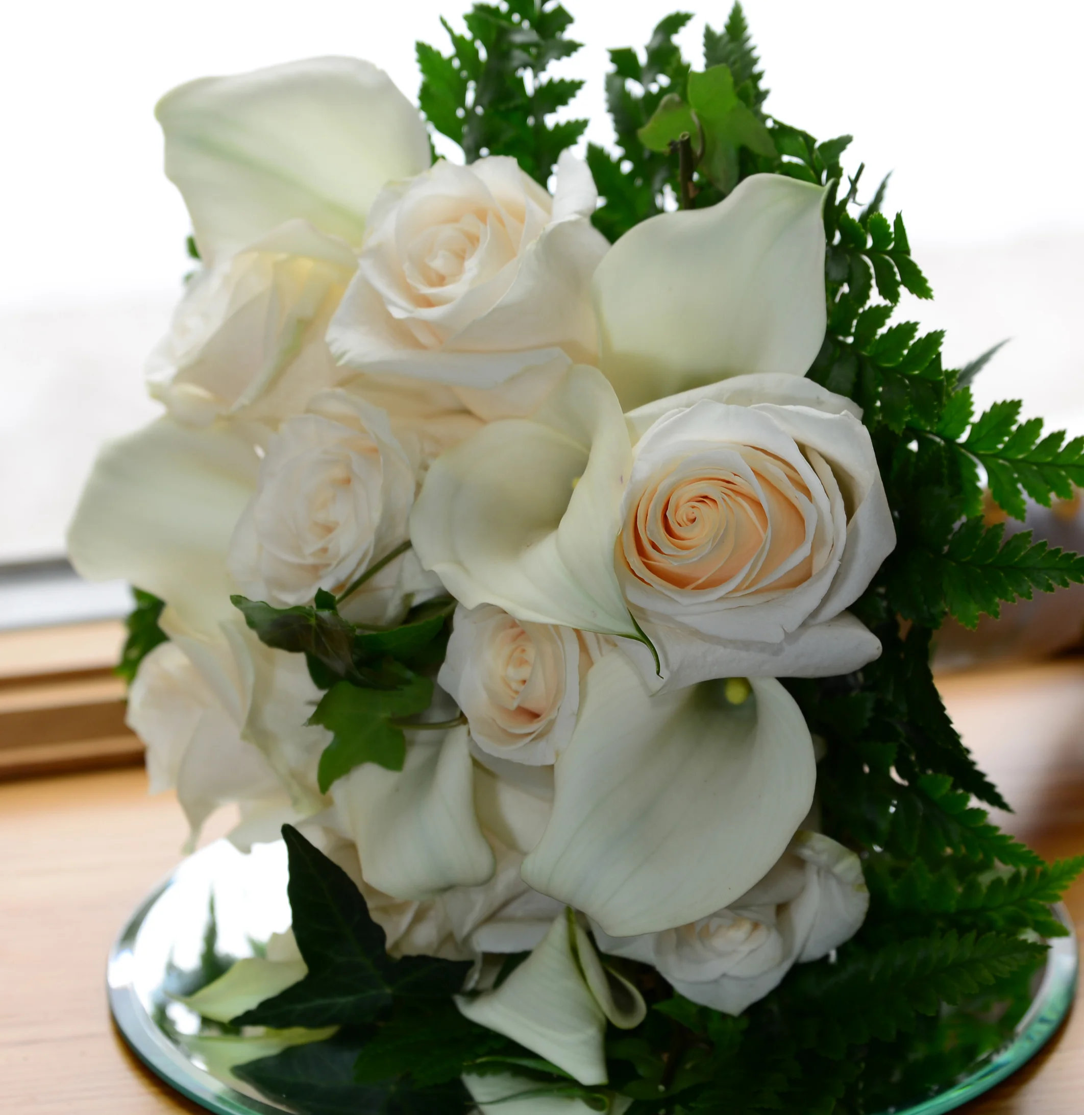 Champagne Roses and White Calla Lilies