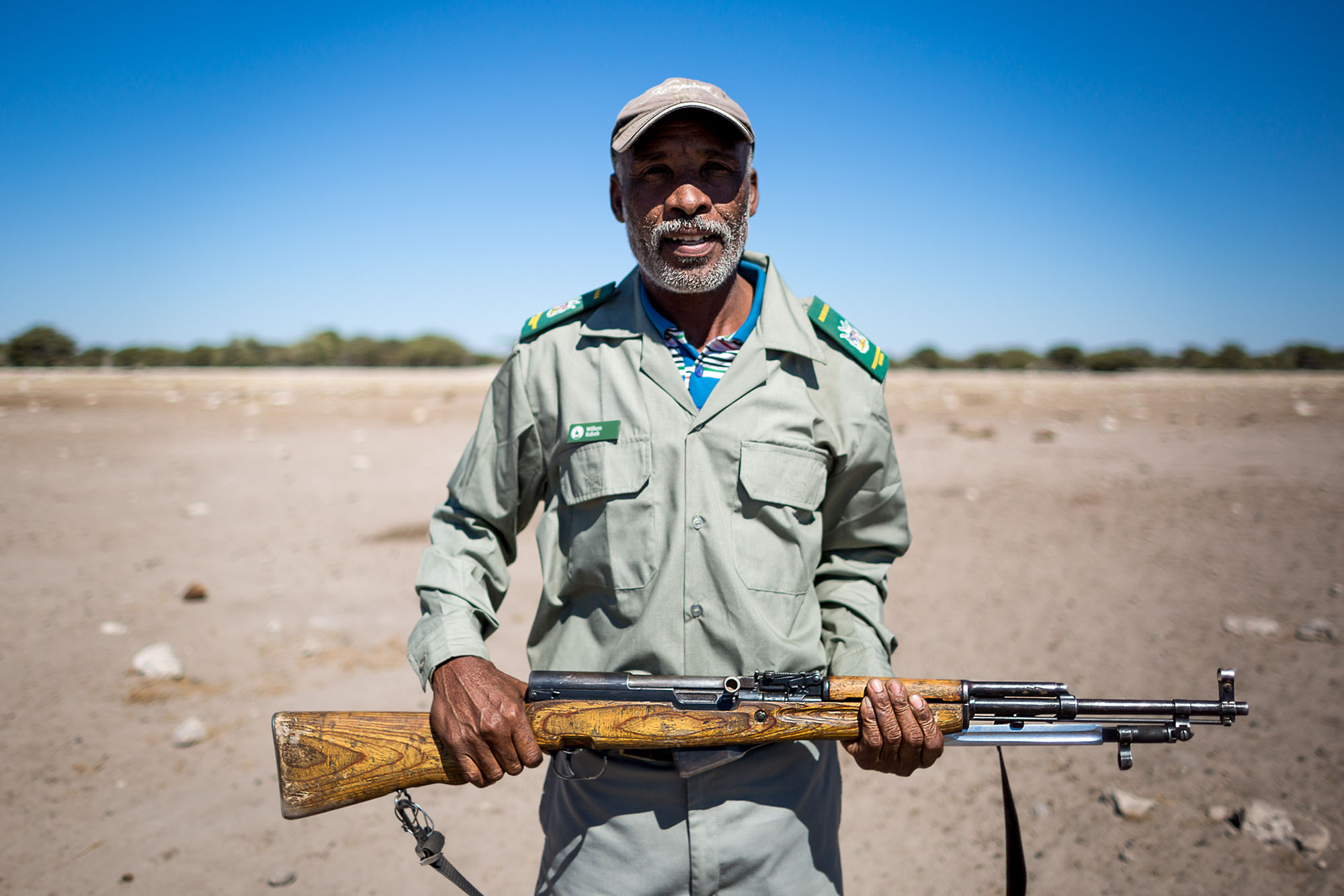MET game guard, Willem Kubeb protects the young scientists from Etosha's potentially dangerous animals.