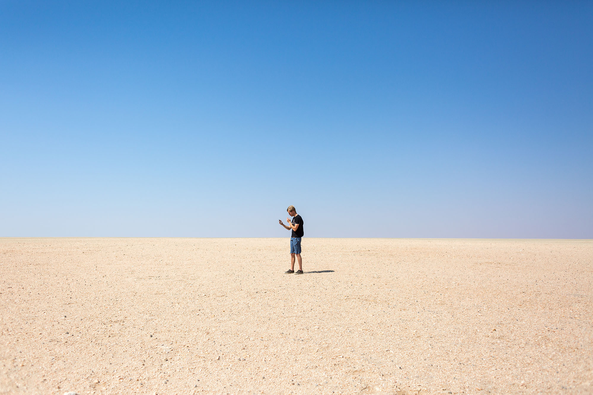 Jasper Vannueville of Vives University College, Belgium attempts to locate a plant with GPS on the desolate gravel plains of the Namib.